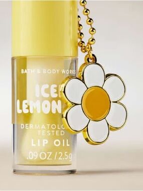 Bath & Body Works Yellow Lip Oil with Daisy Charm